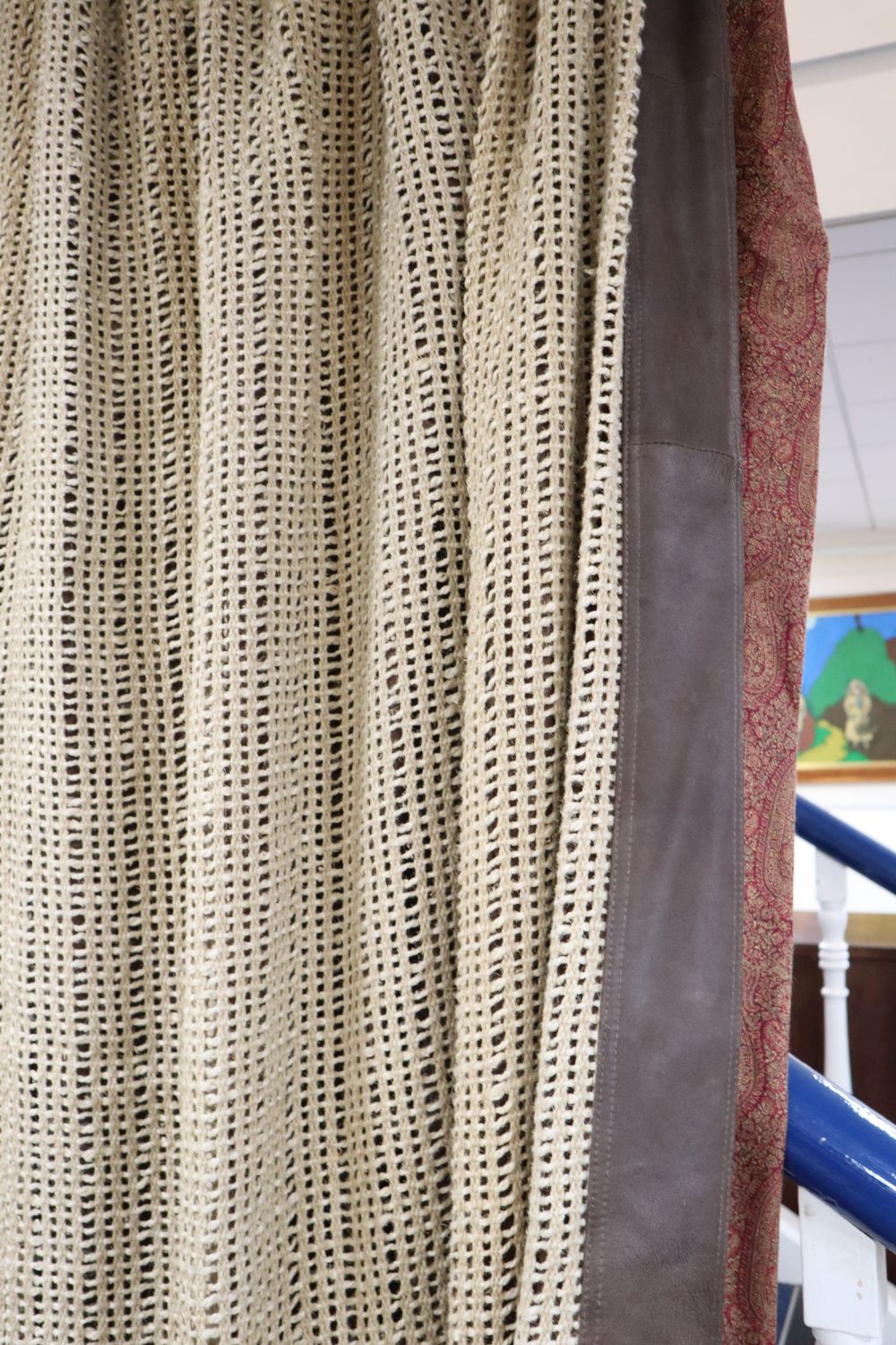 1970's hessian fabric and brown leather curtains, with Paisley fabric trimmed edges.